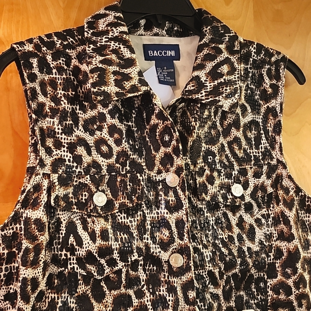 Baccini animal print vest sz S and skirt sz 6. Sold as a set